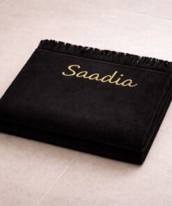 Black prayer rug with name